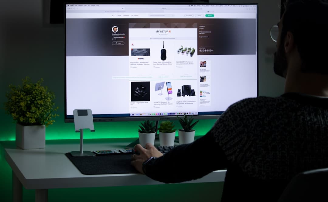 Person viewing multiple website designs on computer screen