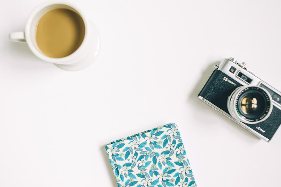 Best website builder for photographers showing photographer workspace and camera