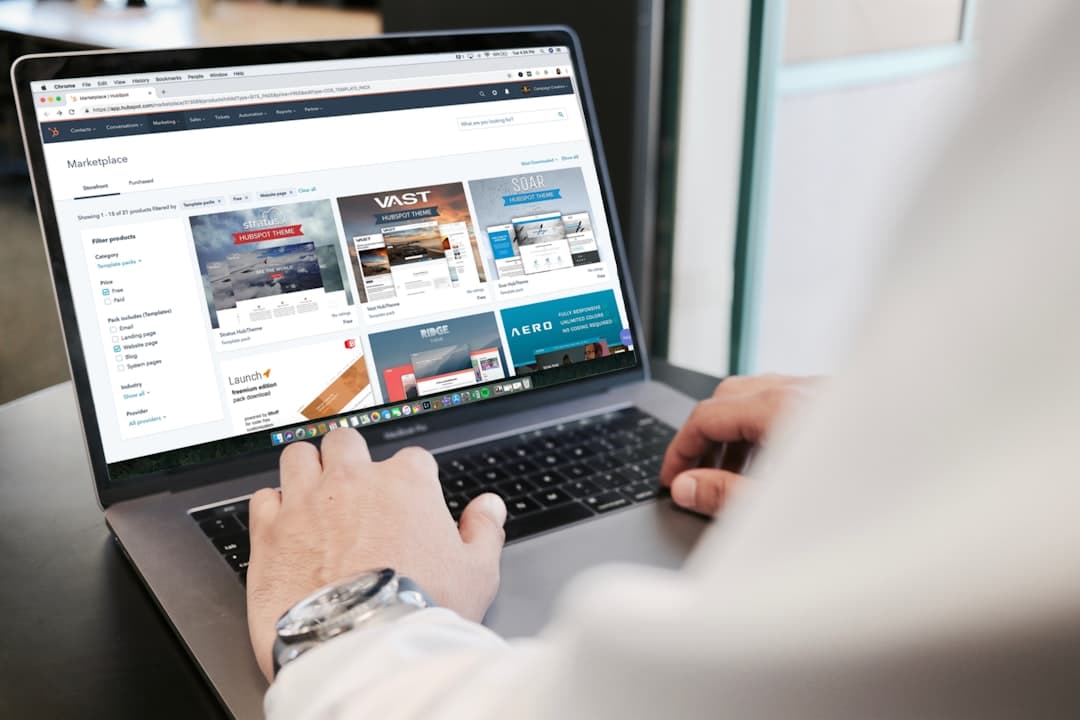Person filling out an online form on a laptop