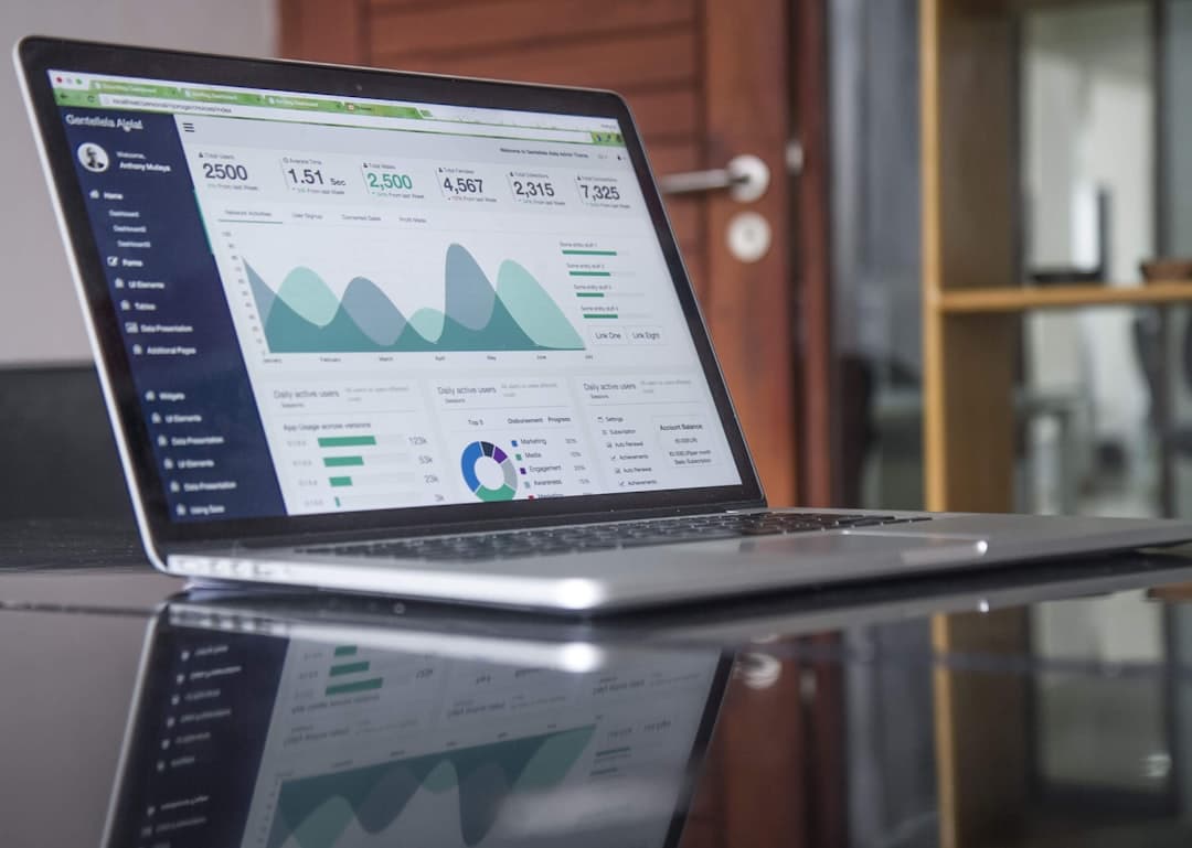 Website analytics charts on a laptop screen