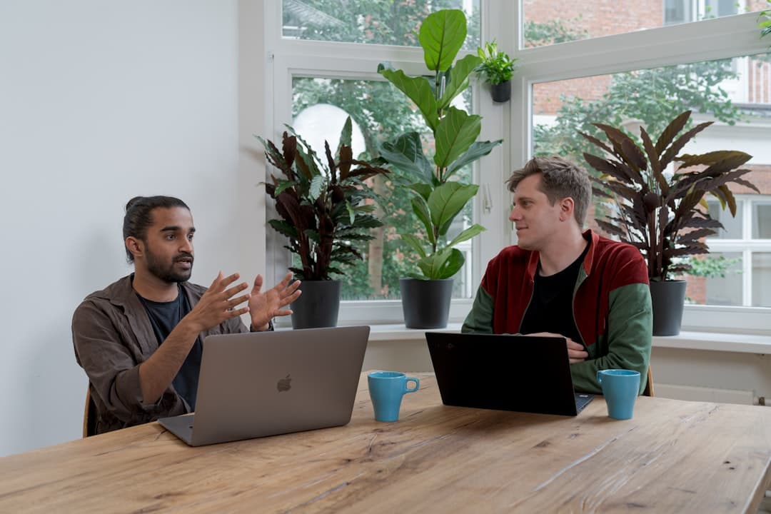 Office team meeting representing HR consulting website design