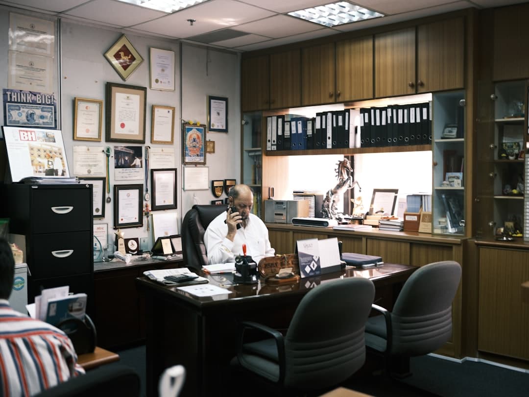 Insurance agent reviewing a policy with a client