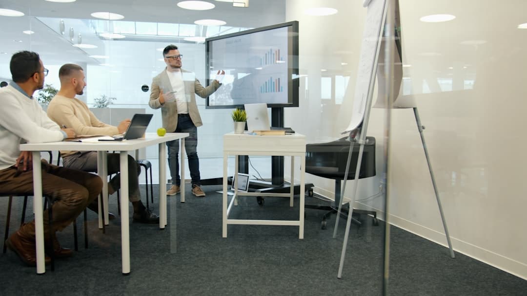 Business strategy meeting representing strategy consulting website design