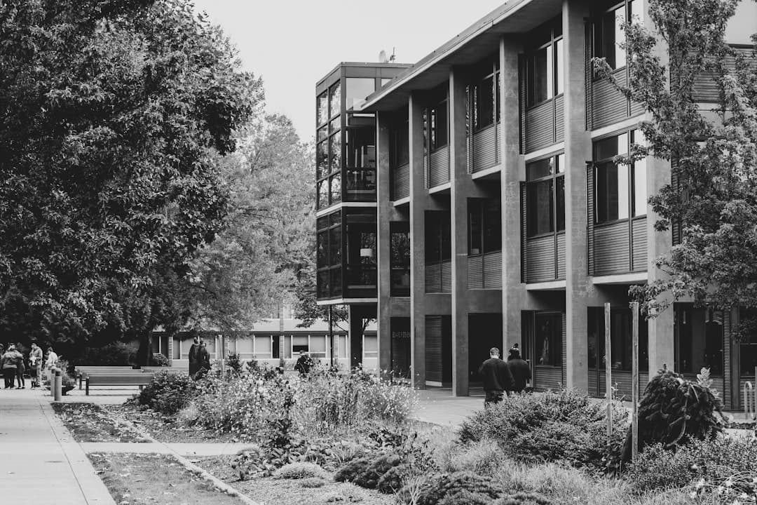 Students walking across a university campus