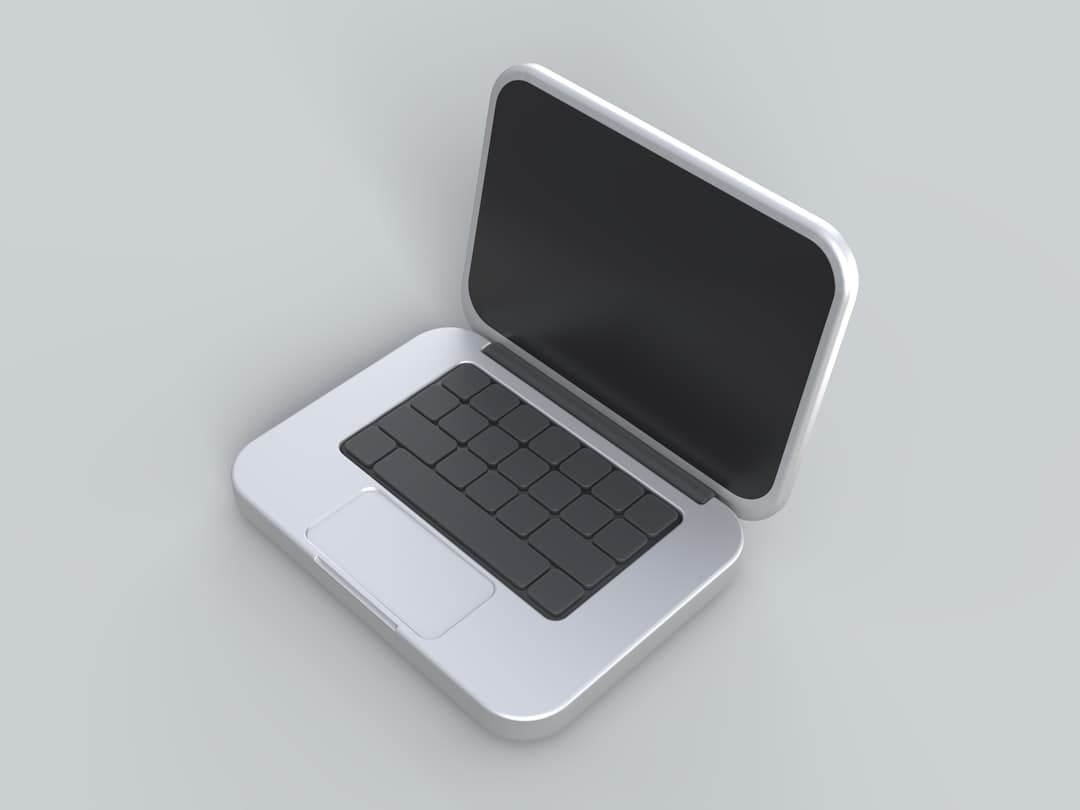 Designer reviewing accessibility audit on a laptop