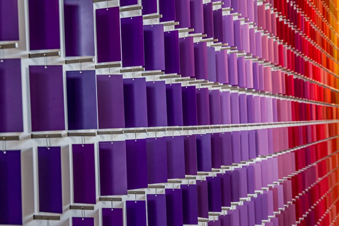 Designer holding color palette swatches