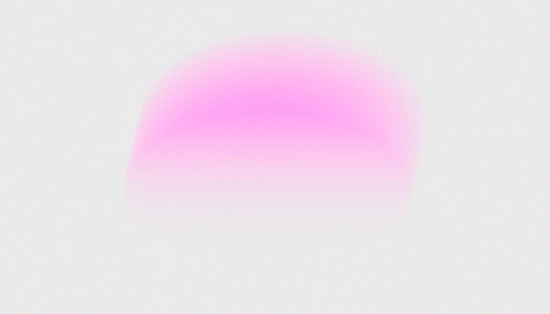 Soft pink gradient on a white background