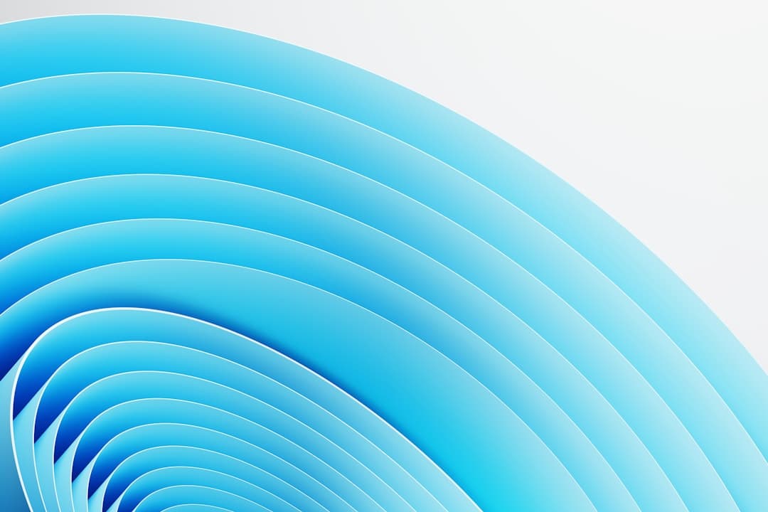 Curving blue layers against a white background