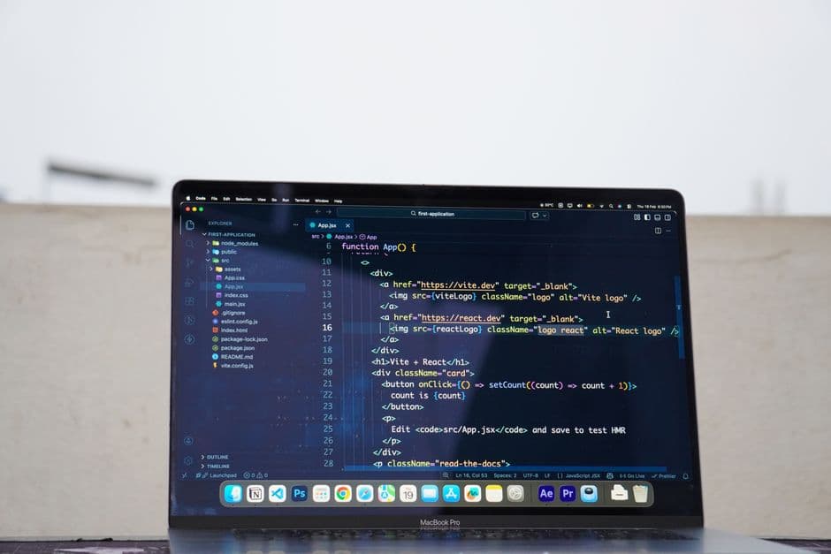Laptop displaying code outdoors, ideal for remote work or freelance programming.