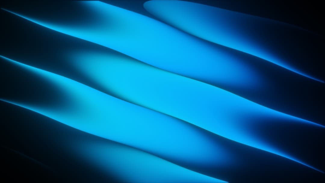 Abstract blue light streaks on a dark background